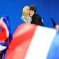 France's incoming president Emmanuel Macron kisses his wife Brigitte after his victory in the first round of the election in April