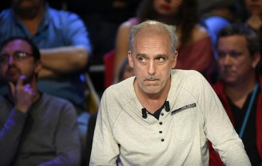 French presidential election candidate for the far-left New Anticapitalist Party (NPA) Philippe Poutou looks on during a debate between the eleven candidates for the French presidential election, on April 4, 2017