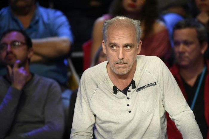 French presidential election candidate for the far-left New Anticapitalist Party (NPA) Philippe Poutou looks on during a debate between the eleven candidates for the French presidential election, on April 4, 2017