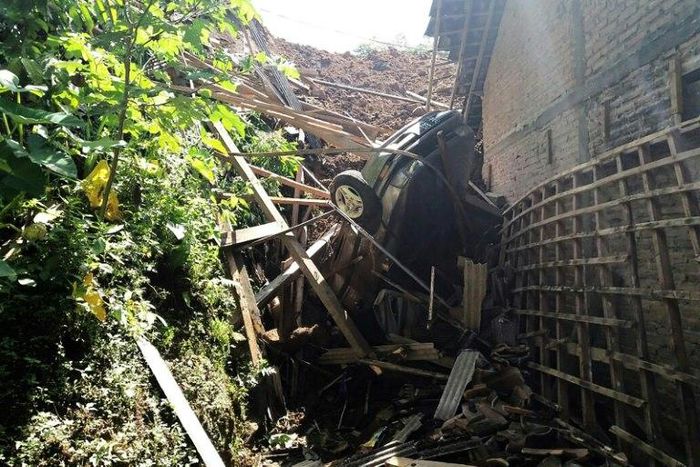 The landslide smashed into the Indonesian village of Banaran in Ponorogo, East Java province, on April 1, 2017
