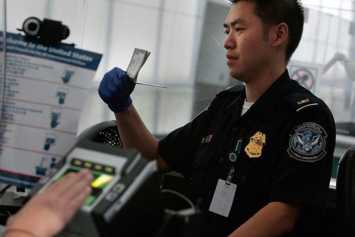 The New York Times reported that airport officials began detaining travelers following the president's executive order closing America's borders to refugees