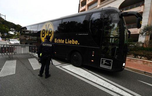 The Dortmund bus arrives under police escort at the Louis II stadium prior to their UEFA Champions League football match against Monaco, on April 19, 2017