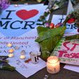 Floral tributes are left for those killed and injured during an Ariana Grande concert at the Manchester Arena
