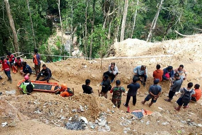 The rescue effort at the remote site on Indonesia's Sulawesi island has been hampered by steep terrain and unstable soil conditions