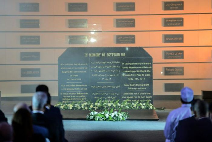 People attend an event marking the first anniversary of the EgyptAir MS804 flight, that crashed in the Mediterranean Sea, in the capital Cairo on May 19, 2017