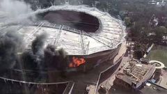 The fire broke out in one corner of the 33,000-capacity stadium, causing considerable damage inside and outside