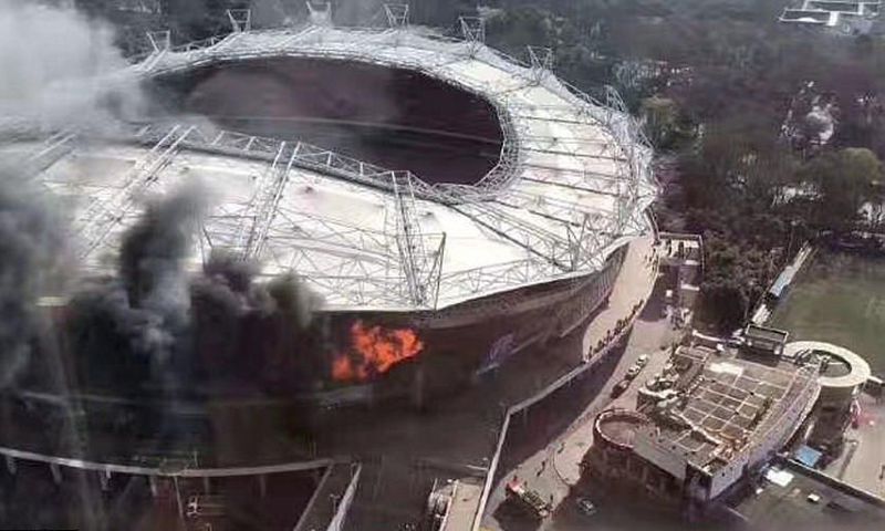 The fire broke out in one corner of the 33,000-capacity stadium, causing considerable damage inside and outside