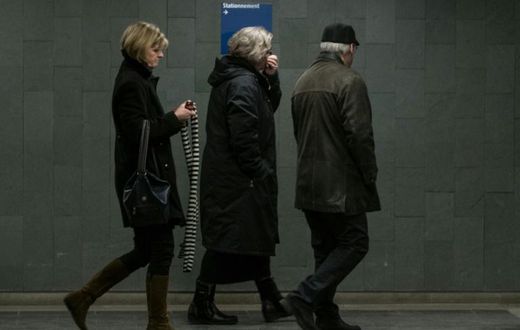 Alexandre Bissonnette's parents, Manon Marchand (L) and Raymond Bissonnette, exit Quebec City courthouse after hearing the sentence for their son on February 8, 2019