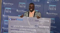 Geoffrey Kipng'etich the Sh12.6m jackpot winner when he went to receive his cheque in Nairobi on December 2, 2016.
