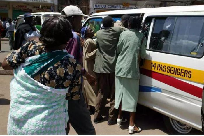 Passengers boarding matatu. Drama ensued as angry passengers attacked and chased a rogue driver and tout for driving recklessly