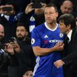 Chelsea manager Antonio Conte (R) says John Terry is unlikely to retire after the FA Cup final match against Arsenal