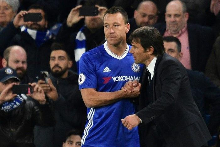 Chelsea manager Antonio Conte (R) says John Terry is unlikely to retire after the FA Cup final match against Arsenal