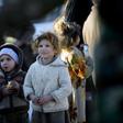 Displaced Iraqis who fled Mosul receive food and drink in Bartalla, east of Mosul