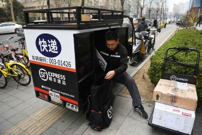 SF Express has an 80,000-strong staff -- using three-dozen aircraft and thousands of vehicles -- delivering throughout China's huge cities