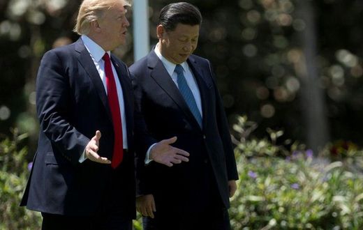 US President Donald Trump (L) said he had made "tremendous progress" in ties with China, adding his relationship with Chinese President Xi Jinping was "outstanding"