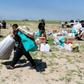A displaced Iraqi receives humanitarian aid supplies at a camp for the internally displaced, in Salamiyah village east of Mosul, on March 27, 2017
