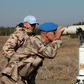 A UN officer monitors the Israel-Syria border in the Israeli-annexed Golan Heights, on November 27, 2016