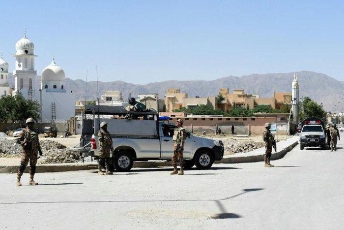 Pakistani soldiers stand guard at the site where a Chinese couple was kidnapped in Balochistan province, which is at the heart of a $50-billion project by Beijing but is racked by separatist and Islamist insurgencies