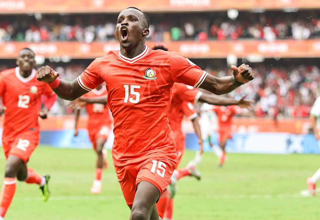 Harambee Stars player Ryan Ogam celebrates after scoring against Morocco in CHAN 2024