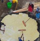 The World's Largest Chapati, attempted by content creator Raymond Kahuma, was rolled for over 1 hour, using custom-made giant rolling pins to  make it flat