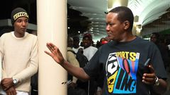 Labour and Social Protection Cabinet Secretary Alfred Mutua seeing off Kenyans at JKIA