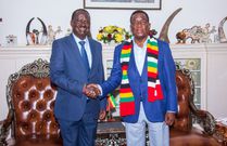 Raila Odinga with President Emmerson Mnangagwa of Zimbabwe