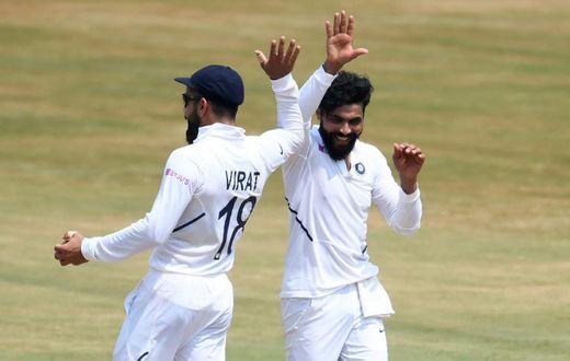 Ravindra Jadeja (right) celebrates with captain Virat Kohli after the dismissal of South Africa's Aiden Markram