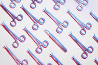 Forceps and a scalpel in pattern