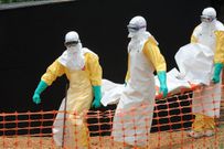 Doctors carrying a body
