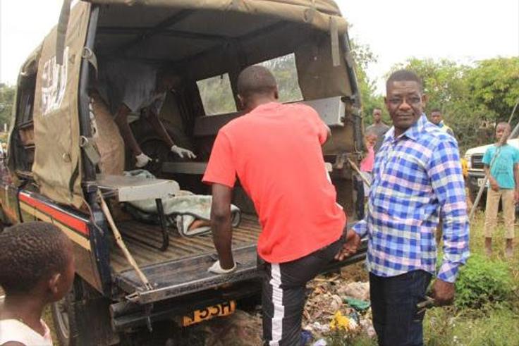 Police collecting a victim's body