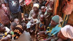 June 2015: Burundian families wait to be registered as refugees at Nyarugusu in northwestern Tanzania