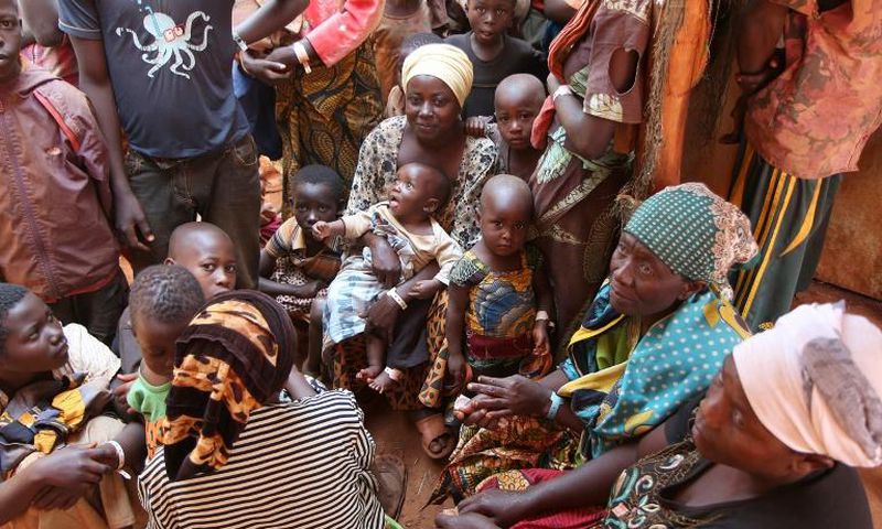 June 2015: Burundian families wait to be registered as refugees at Nyarugusu in northwestern Tanzania