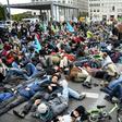 Activists from the "Extinction Rebellion" members demonstrate at Potsdamer Platz square in Berlin