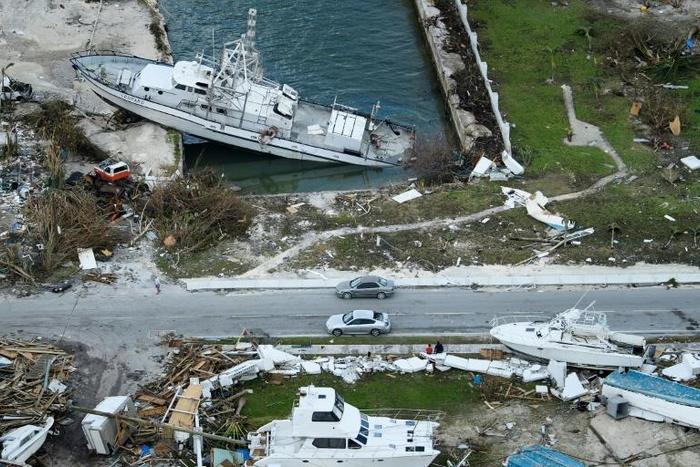 Aerial footage has shown scenes of catastrophic damage in Abaco with hundreds of homes missing roofs, cars submerged or overturned, widespread flooding and boats reduced to matchwood