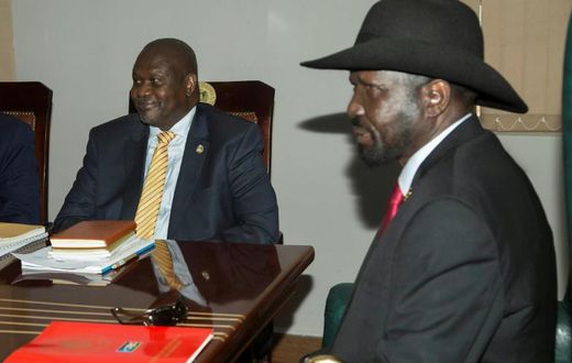 South Sudan rebel leader Riek Machar, left, meets with President Salva Kiir in Juba to try and salvage a peace deal