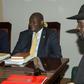 South Sudan rebel leader Riek Machar, left, meets with President Salva Kiir in Juba to try and salvage a peace deal