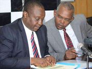 National Treasury Cabinet Secretary Henry Rotich (left) and Principal Secretary Kamau Thugge