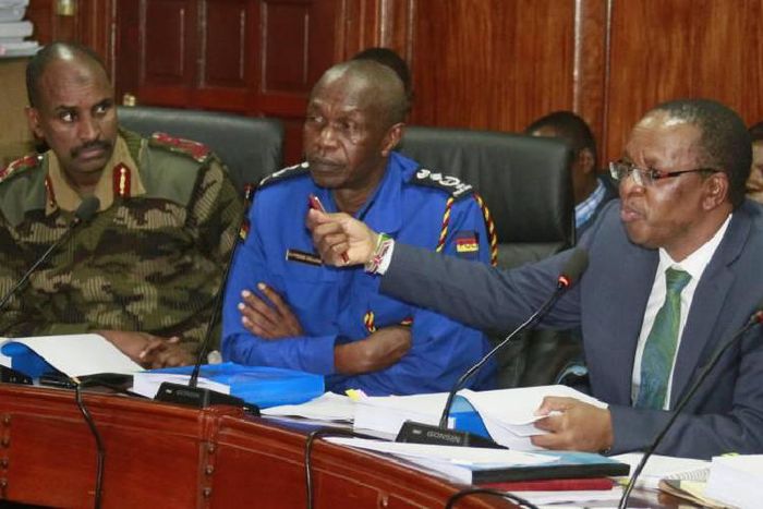 APS DIG Noor Gabow (L), KPS DIG Edward Mbugua (C) and Interior PS Karanja Kibicho (R). 23,900 APs have been ordered to return jungle green uniforms as the officers are transfered to Kenya Police Service