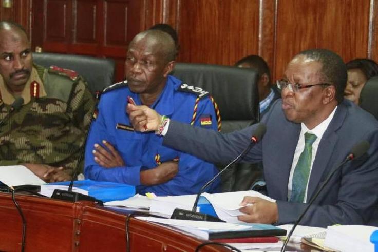 APS DIG Noor Gabow (L), KPS DIG Edward Mbugua (C) and Interior PS Karanja Kibicho (R). 23,900 APs have been ordered to return jungle green uniforms as the officers are transfered to Kenya Police Service