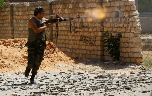 A fighter loyal to Libya's Government of National Accord opens fire on September 7, 2019 -- the UN mission has renewed its mandate and backed struggling ceasefire efforts