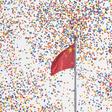 Balloons fly past a national flag at the end of the military parade in Tiananmen Square