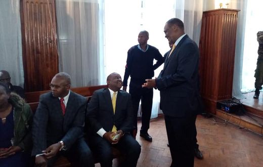 Former Nairobi Governor Evans Kidero consoles Treasury CS Henry Rotich