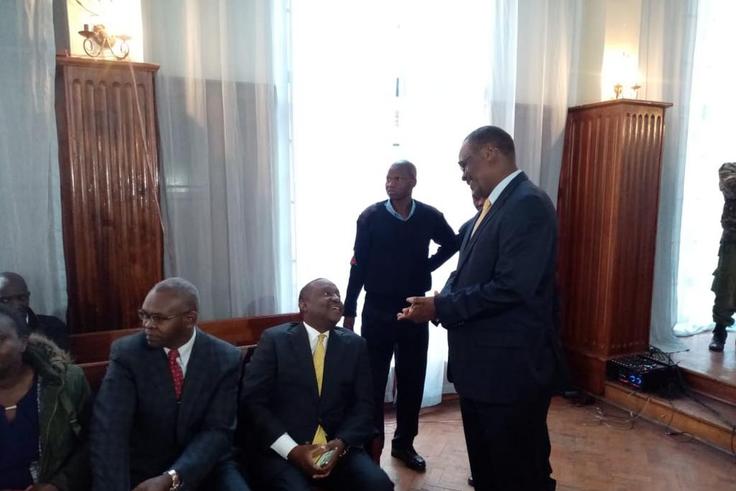 Former Nairobi Governor Evans Kidero consoles Treasury CS Henry Rotich