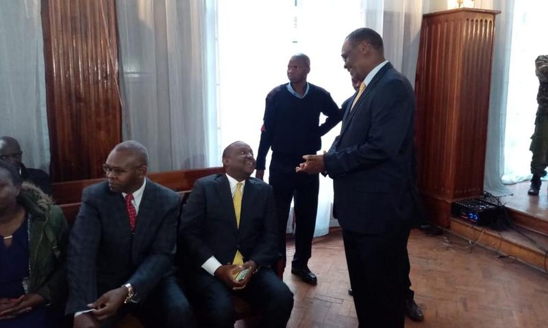 Former Nairobi Governor Evans Kidero consoles Treasury CS Henry Rotich