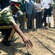 A senior army representative sowing some of the first industrial hemp crop in Zimbabwe at the Harare Central Prison in the capital, on October 11, 2019.The Zimbabwe Industrial Hemp Trust (ZIHT) is the first organization to be issued with a cannabis lic...