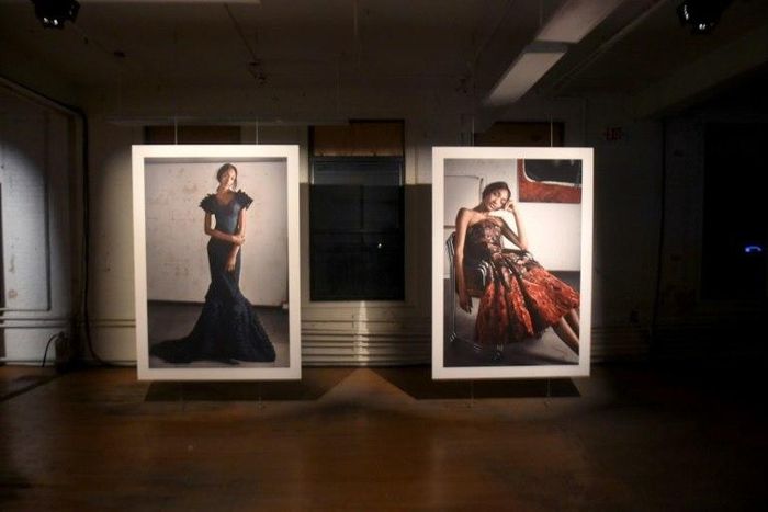 Zac Posen ditched the runway for portraiture with guests free to mingle in front of photographs of a handful of models wearing a paired-down fall/winter 2017 collection