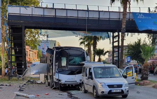 A bus carrying police in Adana, southern Turkey, pictured after being partially destroyed by a road side bomb on September 25, 2019