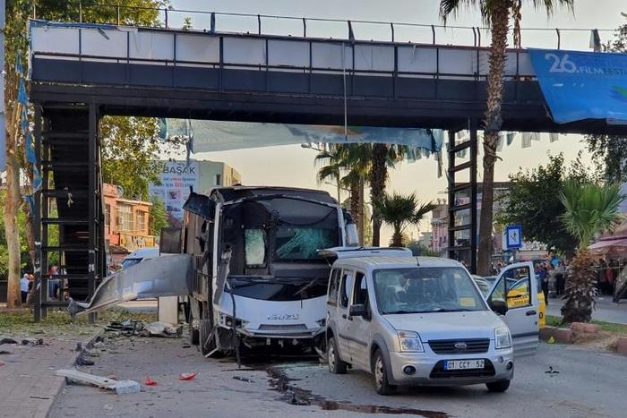 A bus carrying police in Adana, southern Turkey, pictured after being partially destroyed by a road side bomb on September 25, 2019
