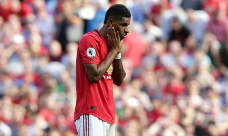 Manchester United striker Marcus Rashford reacts after mssing his penalty