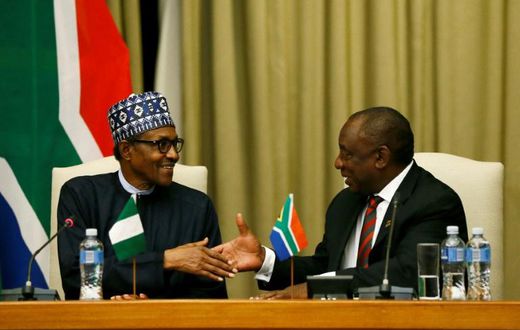 Handshake: Buhari, left, and Ramaphosa